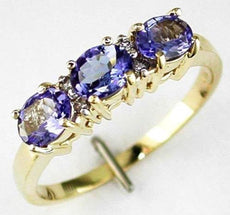 1.05CT DIAMOND & AAA TANZANITE 14KT YELLOW GOLD 3D OVAL & ROUND THREE STONE RING