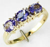 1.05CT DIAMOND & AAA TANZANITE 14KT YELLOW GOLD 3D OVAL & ROUND THREE STONE RING