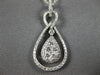 ESTATE .47CT DIAMOND 18KT WHITE GOLD 3D CUSTER TEAR DROP INFINITY LOVE PENDANT
