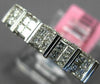 ESTATE WIDE .64CT DIAMOND 18KT WHITE GOLD 3D ROUND & PRINCESS ANNIVERSARY RING