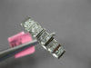ESTATE WIDE .64CT DIAMOND 18KT WHITE GOLD 3D ROUND & PRINCESS ANNIVERSARY RING