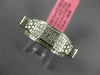 ESTATE WIDE .66CT DIAMOND 18KT WHITE GOLD MULTI SHAPE ELEVATED ANNIVERSARY RING