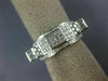 ESTATE WIDE .66CT DIAMOND 18KT WHITE GOLD MULTI SHAPE ELEVATED ANNIVERSARY RING