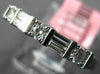 ESTATE .45CT DIAMOND 18KT WHITE GOLD 3D ROUND & BAGUETTE 3MM ANNIVERSARY RING