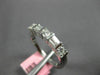 ESTATE .45CT DIAMOND 18KT WHITE GOLD 3D ROUND & BAGUETTE 3MM ANNIVERSARY RING