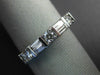 ESTATE .45CT DIAMOND 18KT WHITE GOLD 3D ROUND & BAGUETTE 3MM ANNIVERSARY RING