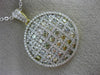2.61CT WHITE & FANCY COLOR DIAMOND 18KT 2 TONE GOLD CRISS CROSS CIRCULAR PENDANT