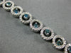 WIDE 3.22CT WHITE & BLUE DIAMOND 14KT WHITE GOLD CIRCULAR ETOILE TENNIS BRACELET