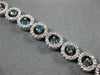 WIDE 3.22CT WHITE & BLUE DIAMOND 14KT WHITE GOLD CIRCULAR ETOILE TENNIS BRACELET