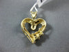 ESTATE SMALL .15CT BAGUETTE DIAMOND 14KT YELLOW GOLD 3D OPEN HEART LOVE PENDANT