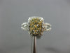1.20CT WHITE & FANCY YELLOW DIAMOND 14KT TWO TONE GOLD RECTANGULAR CLUSTER RING
