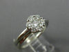ESTATE .62CT DIAMOND 14K WHITE GOLD FLOWER CLUSTER CRISS CROSS LOVE RING #2707