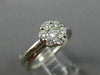 ESTATE .62CT DIAMOND 14K WHITE GOLD FLOWER CLUSTER CRISS CROSS LOVE RING #2707