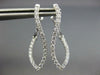 ESTATE .68CT DIAMOND 18KT WHITE GOLD INSIDE OUT INFINITY LOVE HANGING EARRINGS