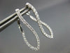 ESTATE .68CT DIAMOND 18KT WHITE GOLD INSIDE OUT INFINITY LOVE HANGING EARRINGS