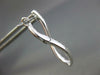 ESTATE .68CT DIAMOND 18KT WHITE GOLD INSIDE OUT INFINITY LOVE HANGING EARRINGS