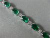 ESTATE 8CT DIAMOND & AAA OVAL EMERALD 14KT WHITE GOLD SEMI BEZEL TENNIS BRACELET