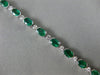 ESTATE 8CT DIAMOND & AAA OVAL EMERALD 14KT WHITE GOLD SEMI BEZEL TENNIS BRACELET