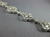 ESTATE WIDE 10.26CT DIAMOND 18KT WHITE GOLD 3D MULTI FLOWER HALO TENNIS BRACELET