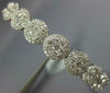 ESTATE WIDE 3.48CT DIAMOND 18KT WHITE GOLD 3D MULTI FLOWER HALO BANGLE BRACELET