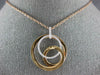 ESTATE LARGE .34CT DIAMOND 18KT WHITE & ROSE GOLD CIRCULAR LOVE KNOT FUN PENDANT