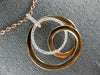ESTATE LARGE .34CT DIAMOND 18KT WHITE & ROSE GOLD CIRCULAR LOVE KNOT FUN PENDANT