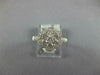 ESTATE WIDE .97CT DIAMOND 18KT WHITE GOLD 3D CLUSTER FLOWER HALO FILIGREE RING