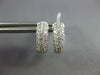 ESTATE WIDE .71CT DIAMOND 18KT WHITE GOLD 3D MULTI ROW PAVE HUGGIE HOOP EARRINGS