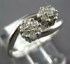 ESTATE .25CT DIAMOND 14KT WHITE GOLD 3D FLOWER CLUSTER CRISS CROSS LOVE RING