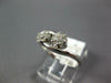 ESTATE .25CT DIAMOND 14KT WHITE GOLD 3D FLOWER CLUSTER CRISS CROSS LOVE RING