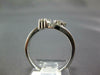 ESTATE .25CT DIAMOND 14KT WHITE GOLD 3D FLOWER CLUSTER CRISS CROSS LOVE RING