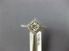 ESTATE .99CT DIAMOND 14KT WHITE GOLD 3D ROUND & PRINCESS HALO ENGAGEMENT RING