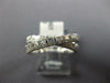 .56CT DIAMOND 14KT WHITE GOLD 3D ROUND & BAGUETTE CRISS CROSS INFINITY LOVE RING