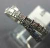 .56CT DIAMOND 14KT WHITE GOLD 3D ROUND & BAGUETTE CRISS CROSS INFINITY LOVE RING