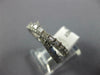 .56CT DIAMOND 14KT WHITE GOLD 3D ROUND & BAGUETTE CRISS CROSS INFINITY LOVE RING