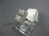 GIA 1.26CT DIAMOND 14KT WHITE GOLD 3D BAGUETTE & ROUND HALO ENGAGEMENT RING
