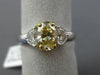1.75CT WHITE & FANCY YELLOW DIAMOND 18KT TWO TONE GOLD HALF MOON ENGAGEMENT RING