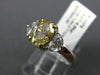 1.75CT WHITE & FANCY YELLOW DIAMOND 18KT TWO TONE GOLD HALF MOON ENGAGEMENT RING