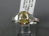 1.75CT WHITE & FANCY YELLOW DIAMOND 18KT TWO TONE GOLD HALF MOON ENGAGEMENT RING
