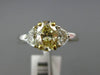 1.75CT WHITE & FANCY YELLOW DIAMOND 18KT TWO TONE GOLD HALF MOON ENGAGEMENT RING