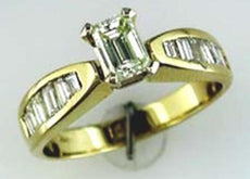 1.30CT DIAMOND 14KT YELLOW GOLD EMERALD CUT & BAGUETTE CHANNEL ENGAGEMENT RING