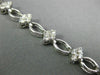 ESTATE WIDE 2.0CT DIAMOND 18KT WHITE GOLD FLOWER CLUSTER TENNIS BRACELET #26551