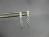 ESTATE .55CT DIAMOND 18KT WHITE GOLD 3D CLASSIC ROUND 2MM OVAL HUGGIE EARRINGS