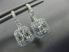 LARGE .86CT DIAMOND 18KT WHITE GOLD ROUND & BAGUETTE LEVERBACK HANGING EARRINGS
