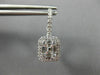 LARGE .86CT DIAMOND 18KT WHITE GOLD ROUND & BAGUETTE LEVERBACK HANGING EARRINGS