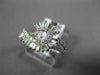 ESTATE .86CT DIAMOND 18KT WHITE GOLD 3D ROUND & BAGUETTE SWIRL SNAKE FUN RING