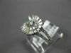 ESTATE .86CT DIAMOND 18KT WHITE GOLD 3D ROUND & BAGUETTE SWIRL SNAKE FUN RING