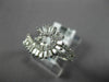 ESTATE .86CT DIAMOND 18KT WHITE GOLD 3D ROUND & BAGUETTE SWIRL SNAKE FUN RING