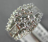 1.0CT ROUND & BAGUETTE DIAMOND 14K WHITE GOLD 3D FLOWER CLUSTER ENGAGEMENT RING