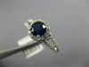 ESTATE 1.28CT DIAMOND & AAA SAPPHIRE 14KT WHITE GOLD ROUND HALO ENGAGEMENT RING
